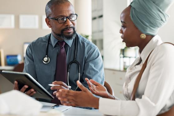Woman talking to a doctor 